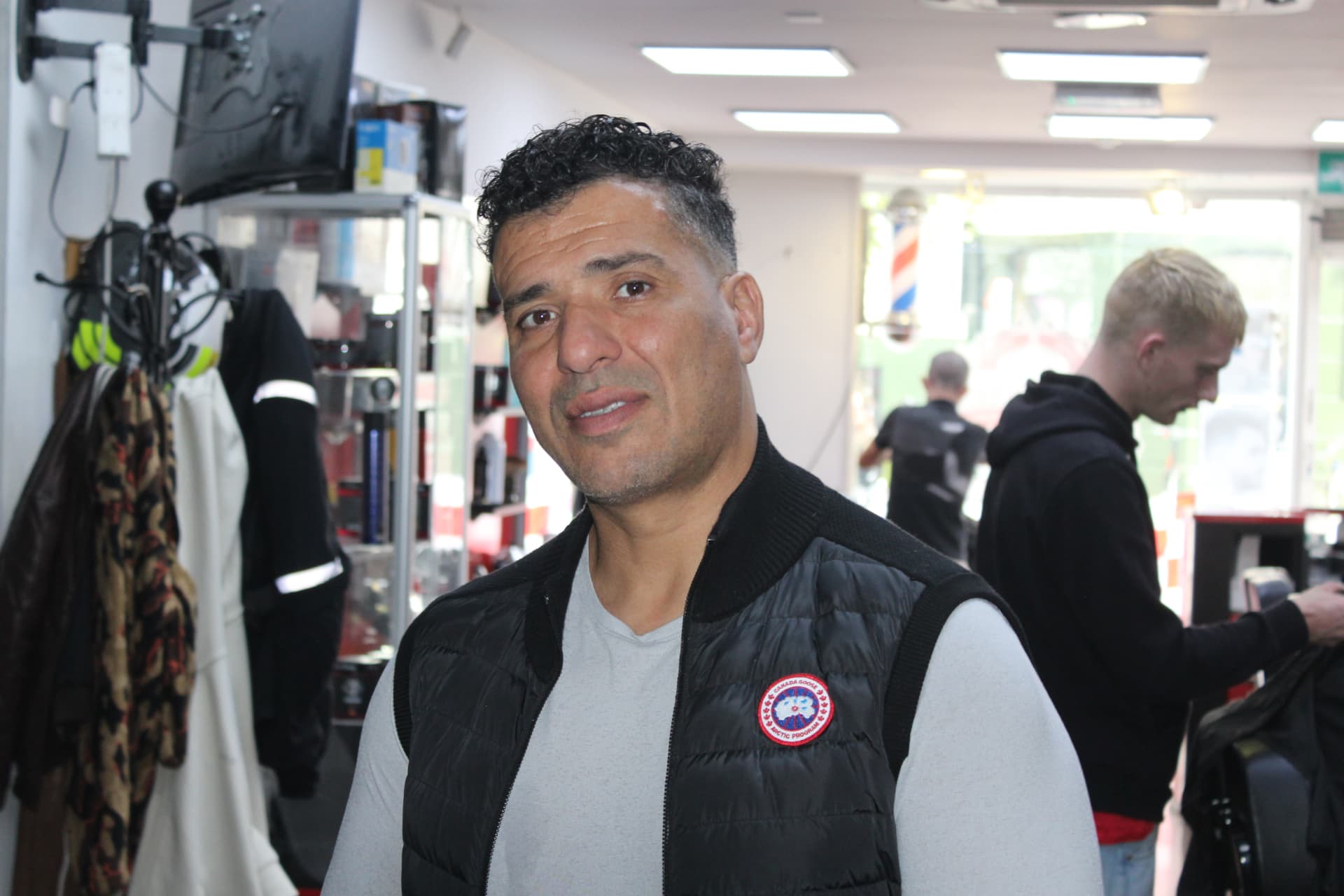 Zidane, owner of City Barbers Cork, inside the shop