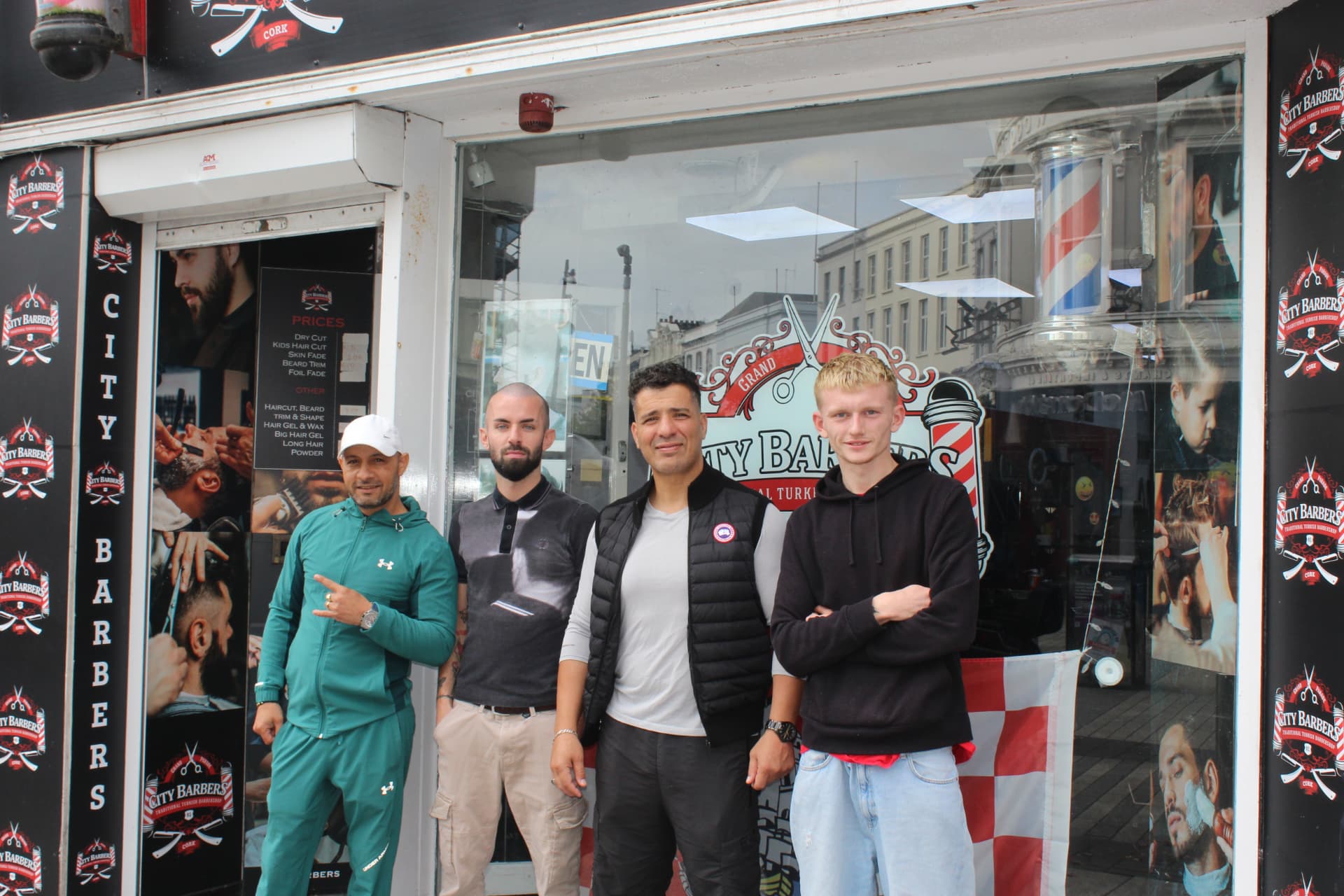 The City Barbers team outside the shop
